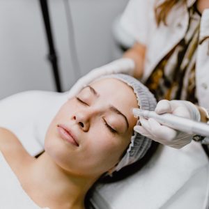 Young woman having a collagen induction therapy